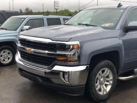 GMC Sierra 1500 pickup truck parked in a lot